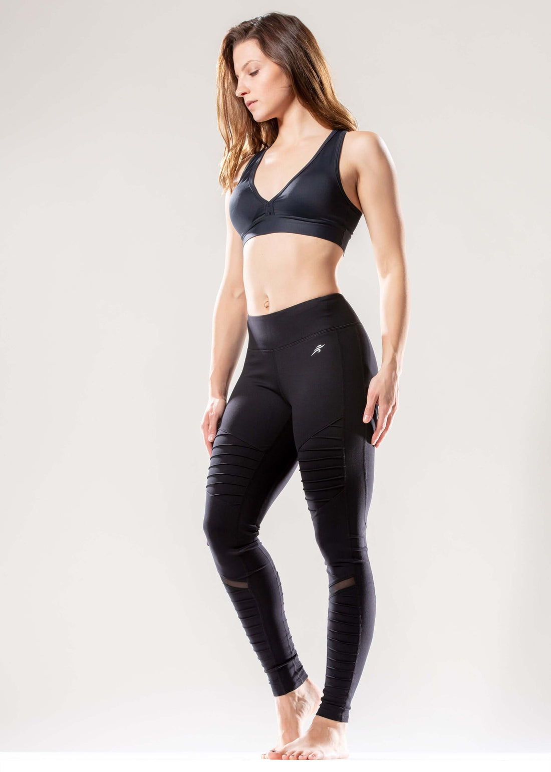 Atletische geribbelde legging met lage taille, verborgen zak en mesh